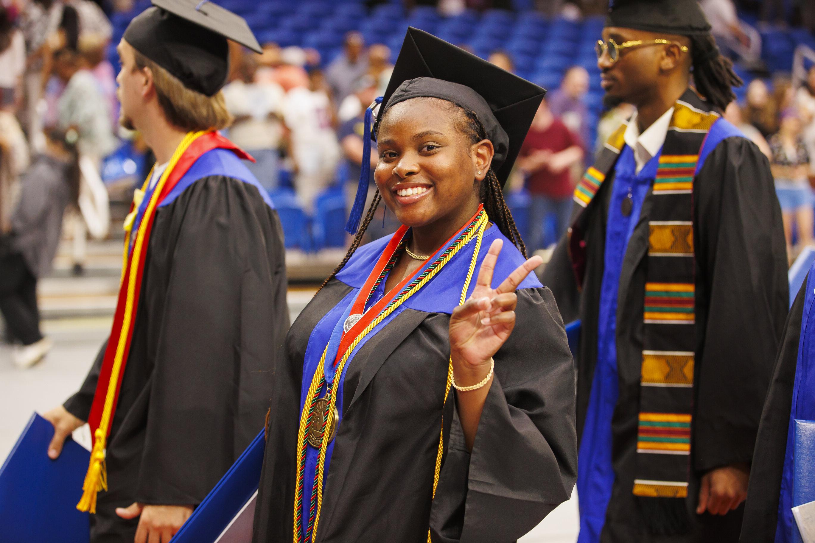 Student walking at Graduation 